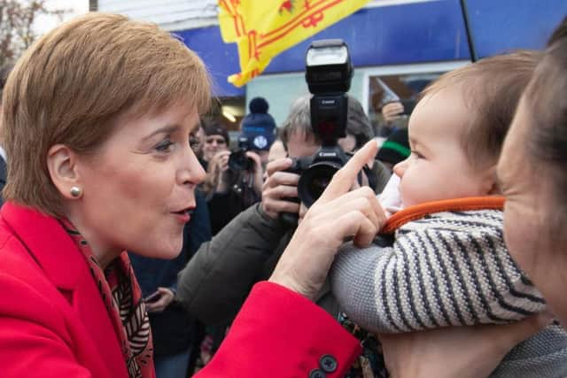 Nicola Sturgeon during a visit to the One Dalkeith Community Hub in Midlothian yesterday. Picture: PA