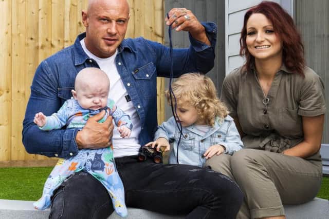 Dan Sparrow, 38, leaped into action when wife Vicki, 28, went into labour early in their living room, and gave birth before paramedics arrived. Picture: SWNS