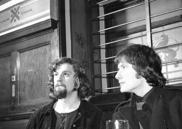 Billy Connolly and Gerry Rafferty of the group the Humblebums in a Glasgow pub called the Old Scotia Bar in the 1960's