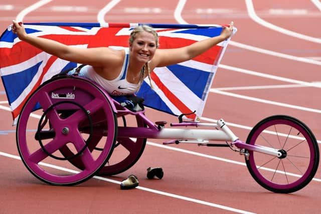 Sammi Kinghorn of Great Britain celebrates after winning gold in the Womens 100m T53 final at the 2017 World ParaAthletics Championships in London. Picture: Mike Hewitt/Getty Images