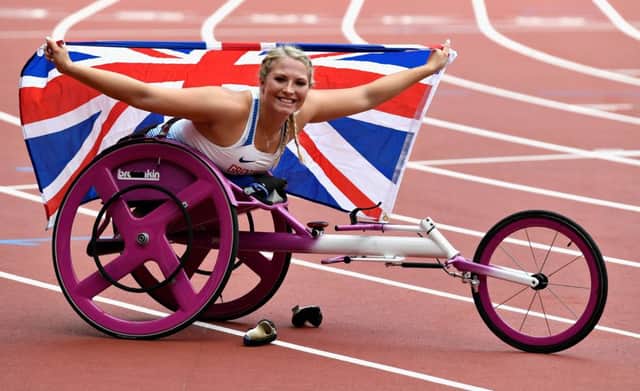 Sammi Kinghorn of Great Britain celebrates after winning gold in the Womens 100m T53 final at the 2017 World ParaAthletics Championships in London. Picture: Mike Hewitt/Getty Images