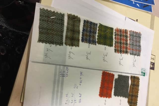 Samples from the Orkney Tweed archives, including several vibrantly coloured swatches which were produced in an attempt to come up with modern trends.