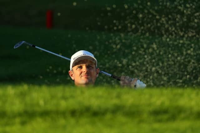 Justin Rose peeks out the bunker at the 18th hole during his opening round at the Turkish Airlines Open in Belek. Picture: Warren Little/Getty Images