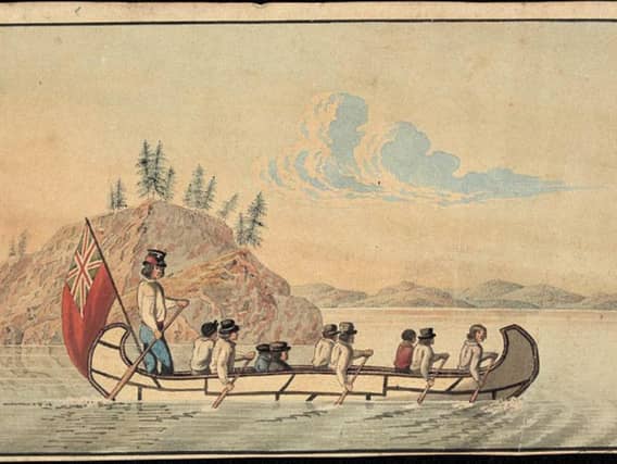 Hudson's Bay Company officials pictured in an express canoe crossing a lake in the early 19th Century. Isobel Gunn, from Tankerness, Orkney, posed as a man to gain employment with the firm. PIC: Creative Commons.