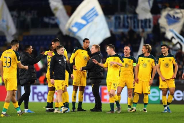 Neil Lennon celebrates with his players following their victory over Lazio in Rome. Picture: Getty