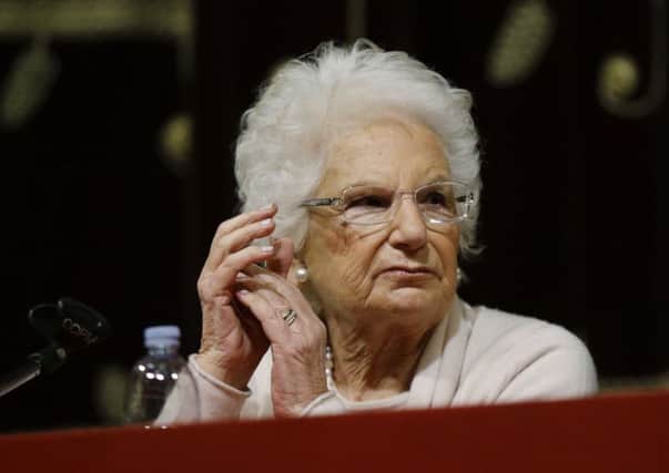 Holocaust survivor and Italian life senator Liliana Segre now has a permanent security escort after receiving hundreds of hate messages (Picture: Luca Bruno/AP)