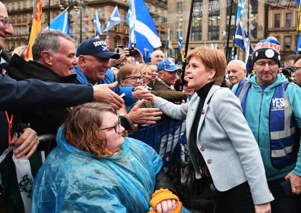 Nicola Sturgeon meets people among the crowd in Glasgow's George Square for a pro-independence rally (Picture: John Devlin)
