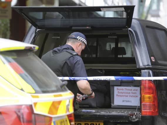 The inquiries are in connection with the incident on King Street last Saturday, when an explosive ordnance disposal van was seen on the street. Picture: AP
