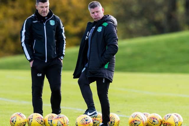 Eddie May, right, and Grant Murray prepare the Hibs team for this weekend's crucial trip to Perth. Picture: SNS