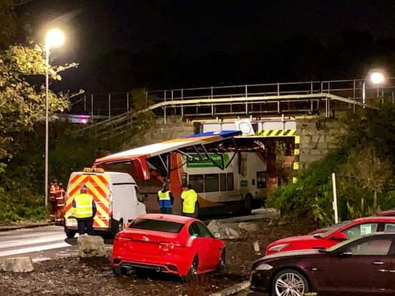 The roof of the bus was almost completely taken off. Picture: Duncan Macpherson