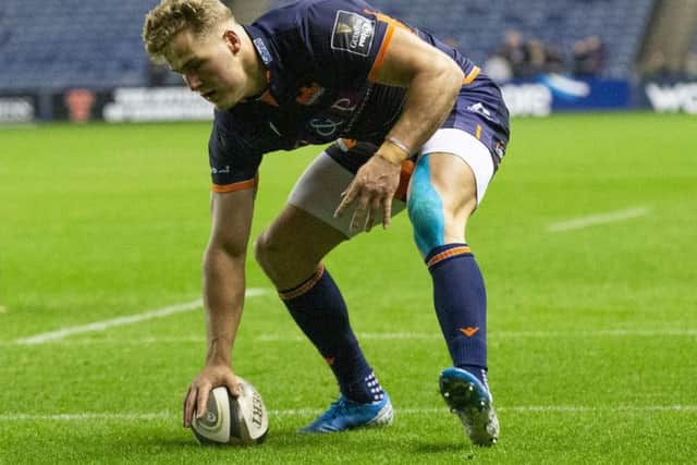 Duhan van der Merwe touches down for Edinburgh's second try against Dragons last night. Picture: Bruce White/SNS