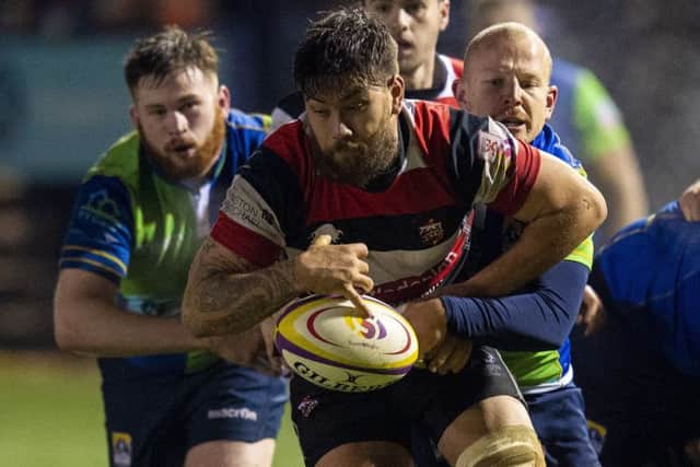 Stirling Countys Dean Taylor-Menzies is tackled by Boroughmuirs Tom Wilson in their Super 6 encounter. Picture: SNS/SRU