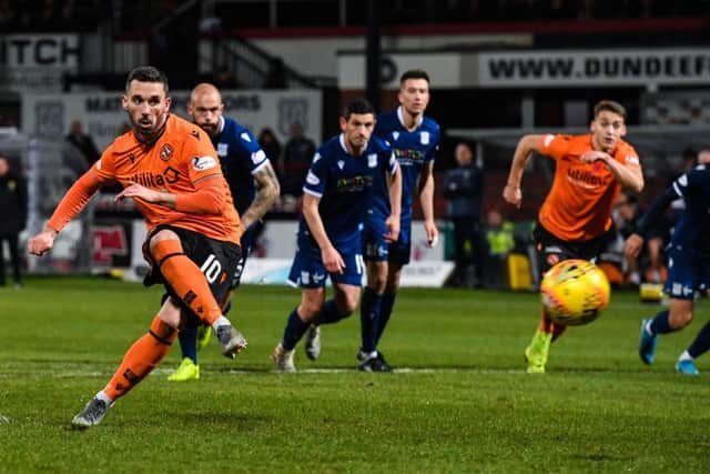 Dundee United's Nicky Clark scores a penalty to make it 1-0. Picture: Alan Harvey / SNS