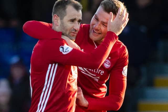 Niall McGinn and Mikey Devlin celebrate Aberdeen's equaliser