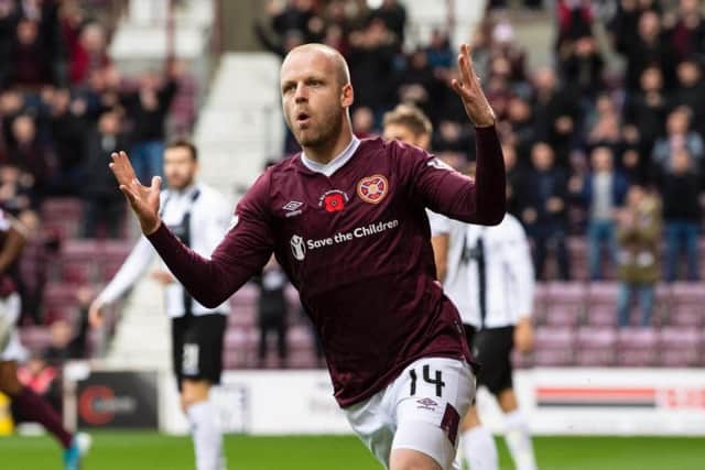 Steven Naismith celebrates the opener on his return to the starting line-up.