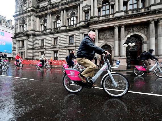Electric bikes have proved an instant hit at Scotlands largest rental scheme with hires of the power-assisted cycles running at twice the rate of its standard bikes.