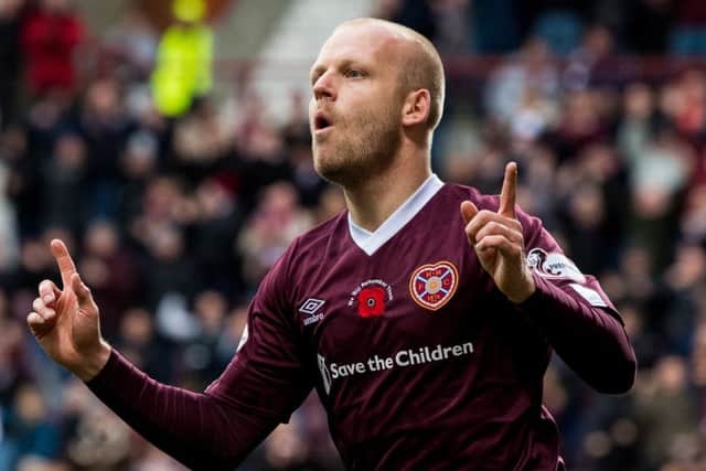 Steven Naismith celebrates after scoring Hearts' opener. Picture: SNS.