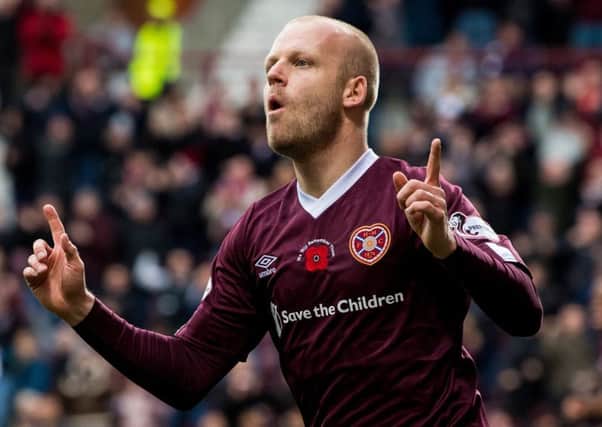 Steven Naismith celebrates after scoring Hearts' opener. Picture: SNS.