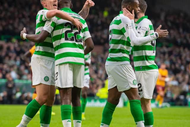 The Celtic players celebrate with Odsonne Edouard after he opened the scoring. Picture: SNS