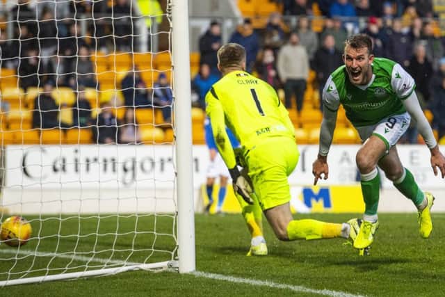 Hibs forward Christian Doidge celebrates his hat-trick to make it 4-0 during the Premiership match against St Johnstone. Picture: Alan Harvey/SNS