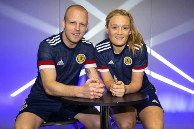 Scotland womens team player Erin Cuthbert joined Steven Naismith at a Scotland national team kit launch at JD Sports in Glasgow yesterday. Naismith is back in the Scotland team after being out of the Hearts side for two months with a hamstring injury. Picture: Ross MacDonald/SNS