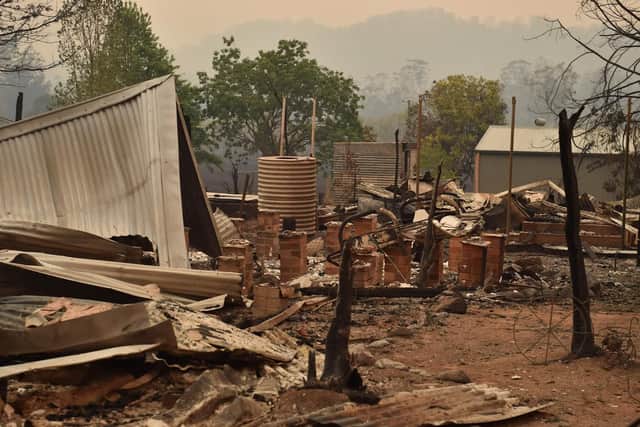 orth of New South Wales, wildfires destroyed nine homes on Monday in Queensland state, where air quality plummeted in Brisbane, the state capital, and surrounding cities.