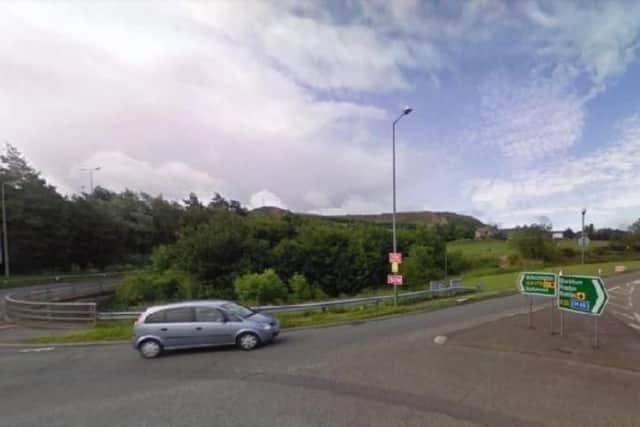 A 2-year-old girl is in a serious condition after falling from a BMW X5 on the A56 in Lancashire before being hit by another vehicle. Pic: Google Street View