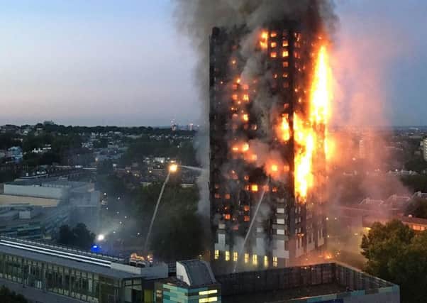 The 24-storey Grenfell Tower in west London was rapidly engulfed by the fire in June 2017 as it spread along the building's flammable cladding. (Picture: Getty Images)