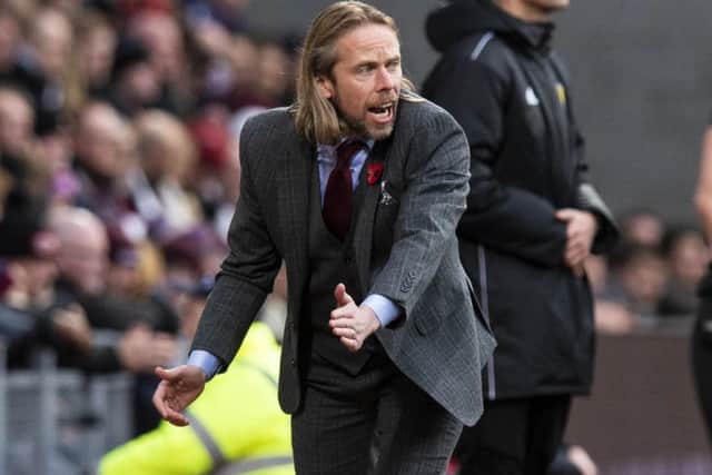 Austin MacPhees credentials have been questioned but not by Hearts defender Michael Smith. Picture: SNS.