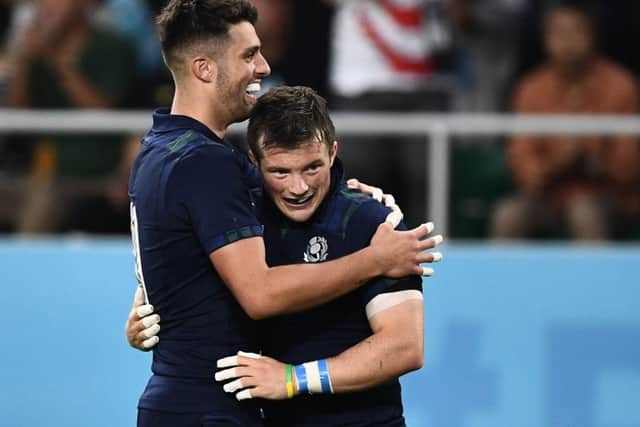 George Horne, right, celebrates his World Cup try against Russia with Adam Hastings. The pair have made a big impact on their return. Picture: AFP/Getty