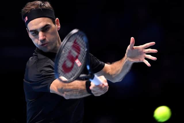 Roger Federer plays a forehand in the win over Matteo Berrettini. Picture: Justin Setterfield/Getty Images