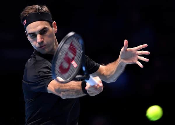 Roger Federer plays a forehand in the win over Matteo Berrettini. Picture: Justin Setterfield/Getty Images