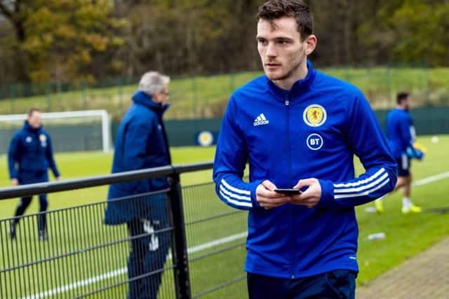Andy Robertson will remain with the Scotland suad until they fly out to Cyprus. Picture: Craig Williamson/SNS