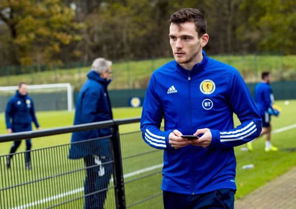 Andy Robertson will remain with the Scotland suad until they fly out to Cyprus. Picture: Craig Williamson/SNS