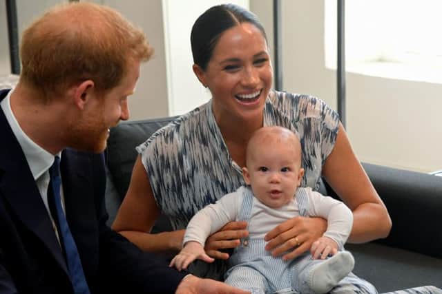 Harry, Meghan and Archie on their recent trip to Cape Town. Picture: Toby Melville/PA Wire