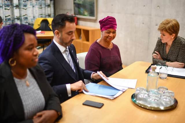 First Minister Nicola Sturgeon meets the mother of Sheku Bayoh, Aminata Bayoh, and his sister Adama Kadijartu Johnson along with lawyer Aamer Anwar at the Scottish Parliament (Picture: Jeff J Mitchell/Getty Images)