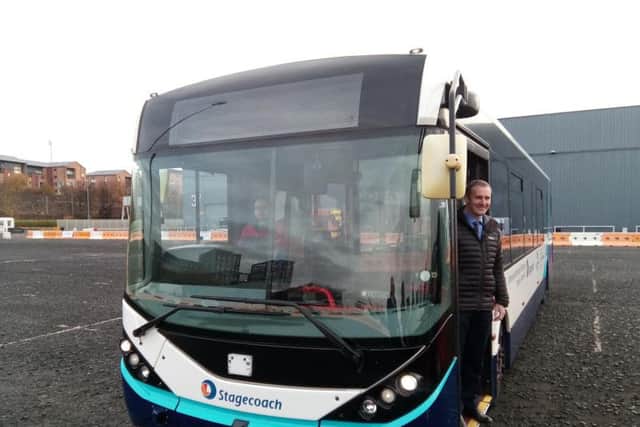 Transport secretary Michael Matheson about to take a trip on the bus. Picture: The Scotsman
