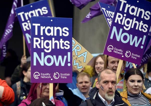 Campaigners for trans rights, which has grown as a political issue in recent years, protest outside the Scottish Parliament (Picture: Lisa Ferguson)