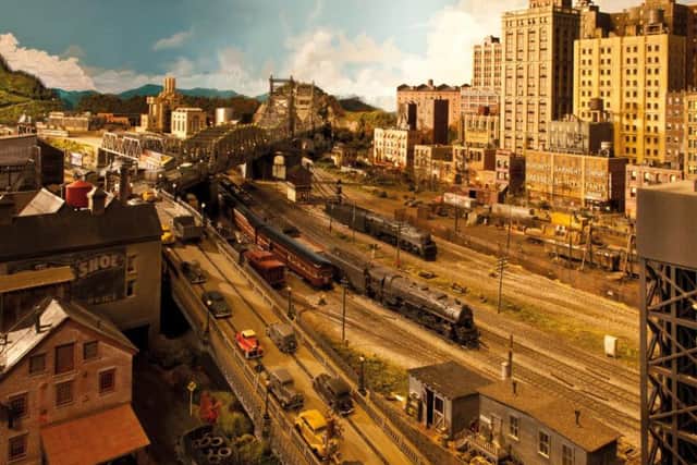 The model railway, called Grand Street and Three Rivers City, is based on an American city in the 1940s. Picture: PA