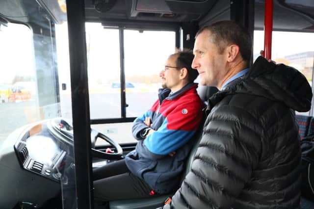 Transport secretary Michael Matheson trialling the new autonomous bus