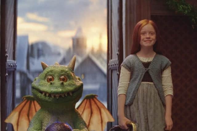 Ruby Dailly stars alongside Edgar, an excitable computer-generated dragon, in John Lewis's latest Christmas advert. Picture: PA