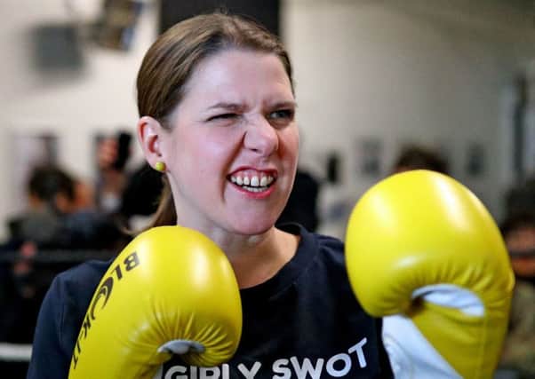 Jo Swinson joins in the general election obsession with boxing as she highlights Boris Johnson's description of David Cameron as a "girly swot" (Picture: Aaron Chown/PA Wire)