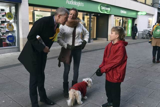Willie Rennie canvassing for the Lib Dems yesterday in the Newkirkgate shopping centre in Leith . Picture: Lisa Ferguson