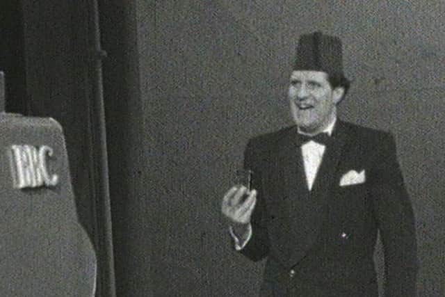 Comedian Tommy Cooper was known for his spectacular table cloth trick (Picture: PA)