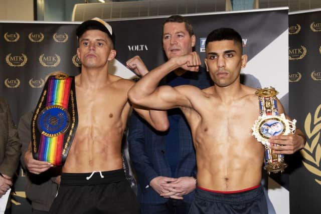 Kash Farooq, right, at the weigh-in alongside Lee McGregor, says he has wanted this fight since the turn of the year. Picture: SNS.