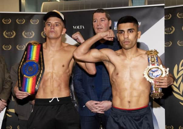 Kash Farooq, right, at the weigh-in alongside Lee McGregor, says he has wanted this fight since the turn of the year. Picture: SNS.