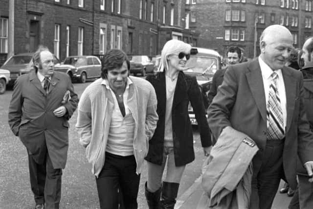 George Best and wife Angie with Hibs chairman Tom Hart at Easter Road in November 1979.