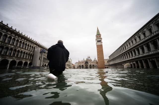 High tide in Venice peaked at five feet above sea level which prompted the mayor to close St Marks Square. Picture: Getty