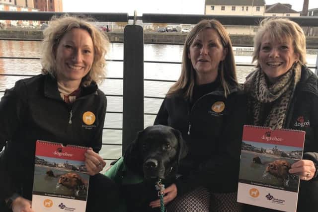 From left: Fiona Corner, Nadia Sutherland and Margaret Reynolds with Alex the assistance dog. Picture: Contributed