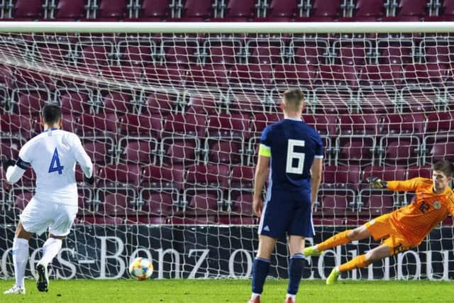 Dimitos Nikolaou scores with a late penalty to give Greece a 1-0 victory at Tynecastle. Picture: SNS.